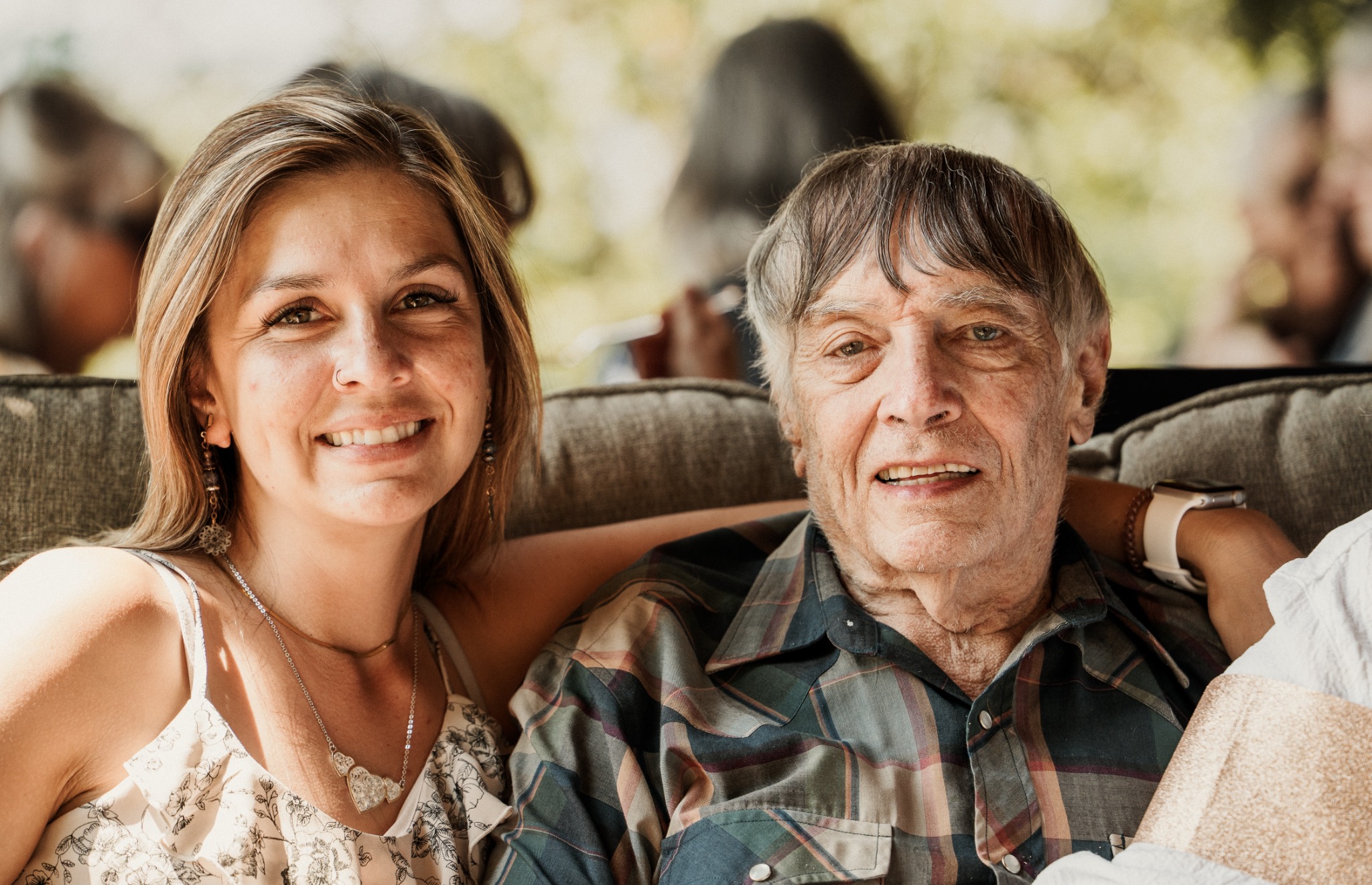 A younger woman and older man together