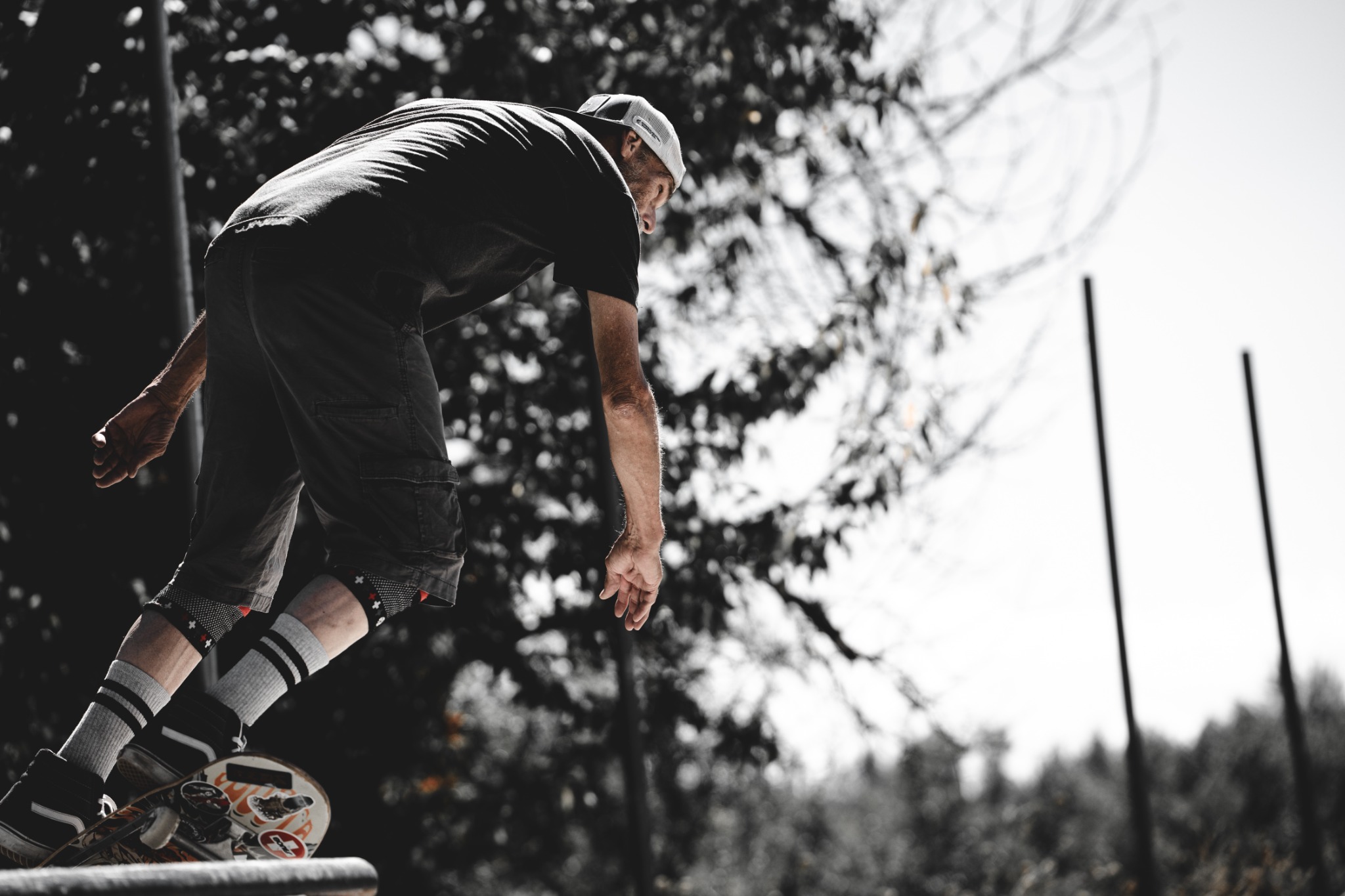 A skateboarder above the street