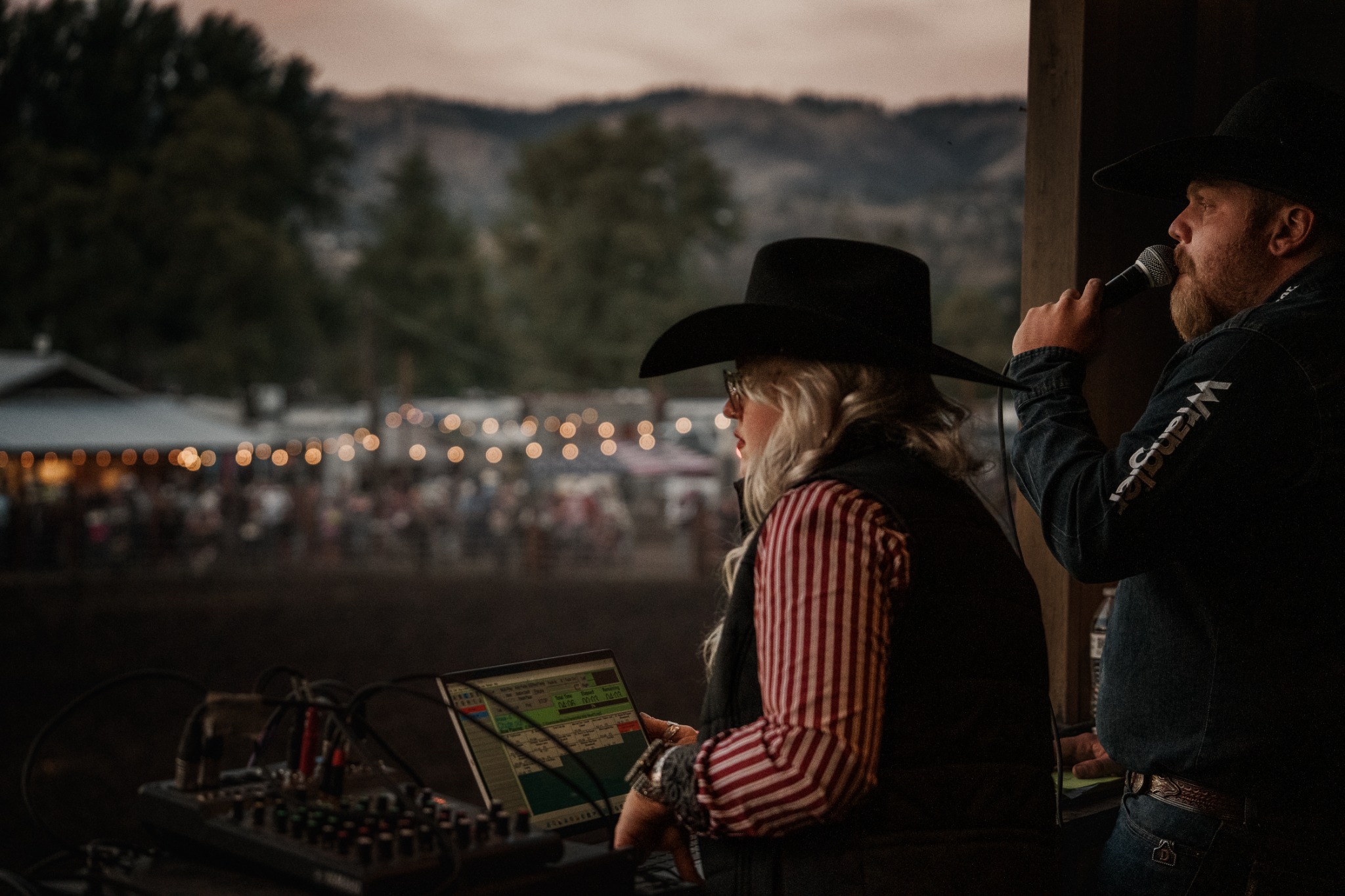 Two men working the sound booth